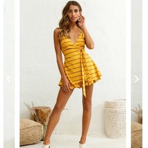 Selfie Leslie Libra Crossover Wrap Romper Stripe Print in Mustard in size M